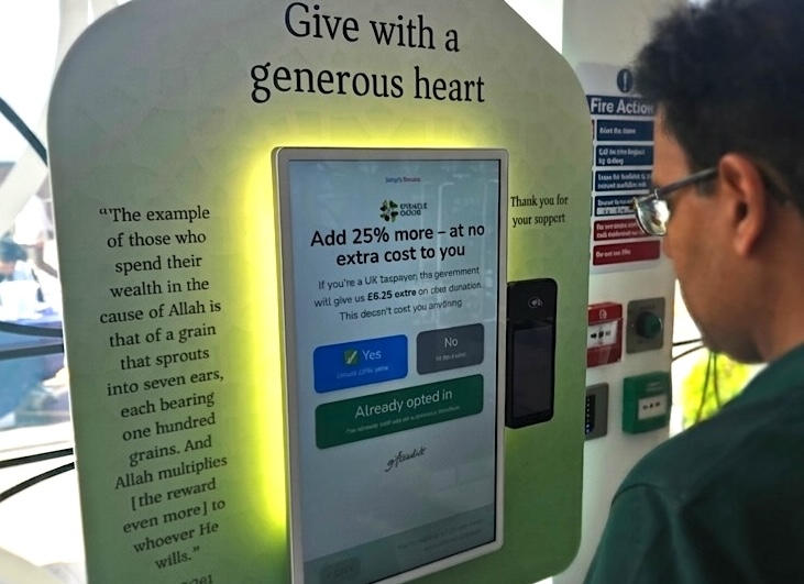 Donor scanning a QR code to complete a Gift Aid declaration and email their receipt