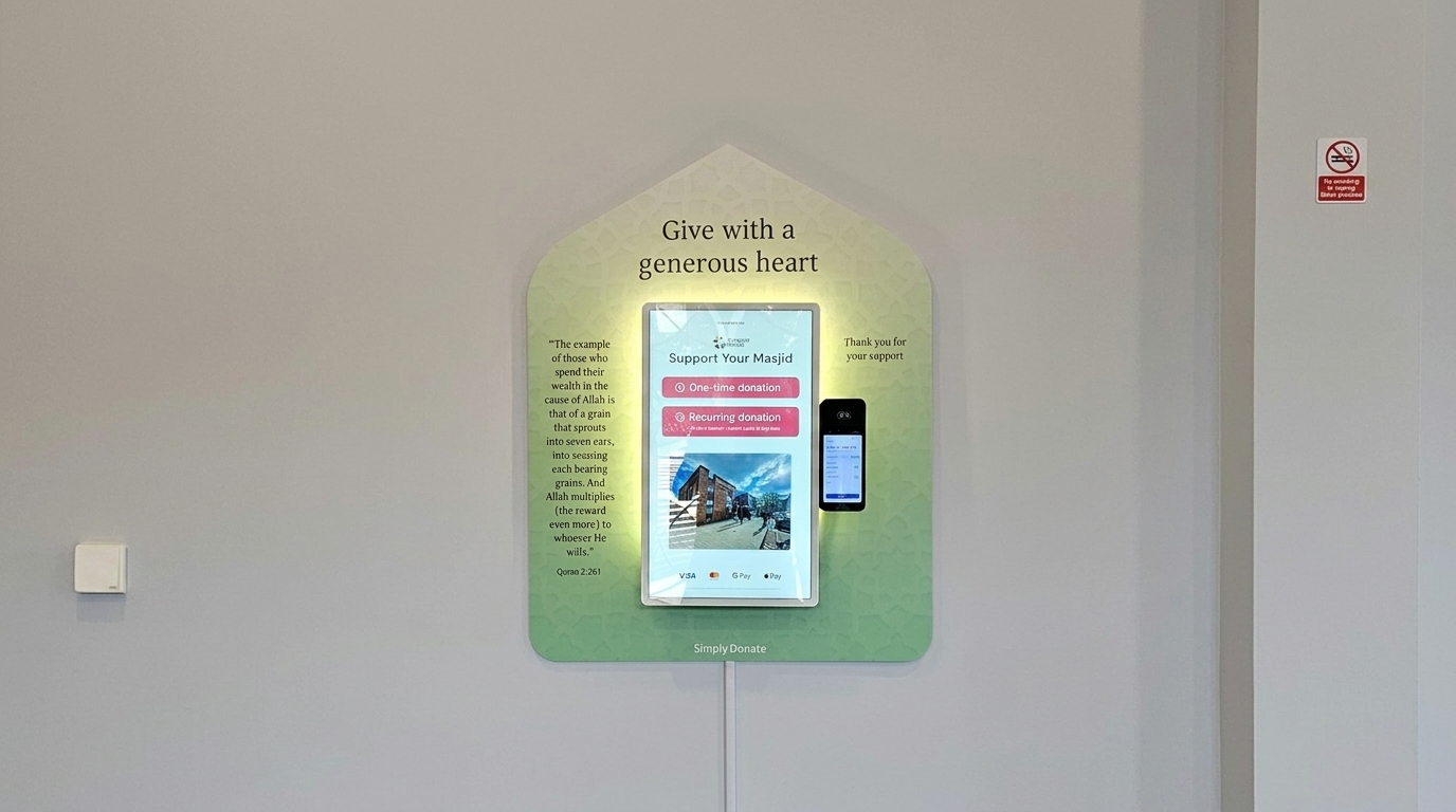 Simply Donate kiosk wall-mounted in a masjid, showing the donation screen with one-time and recurring options